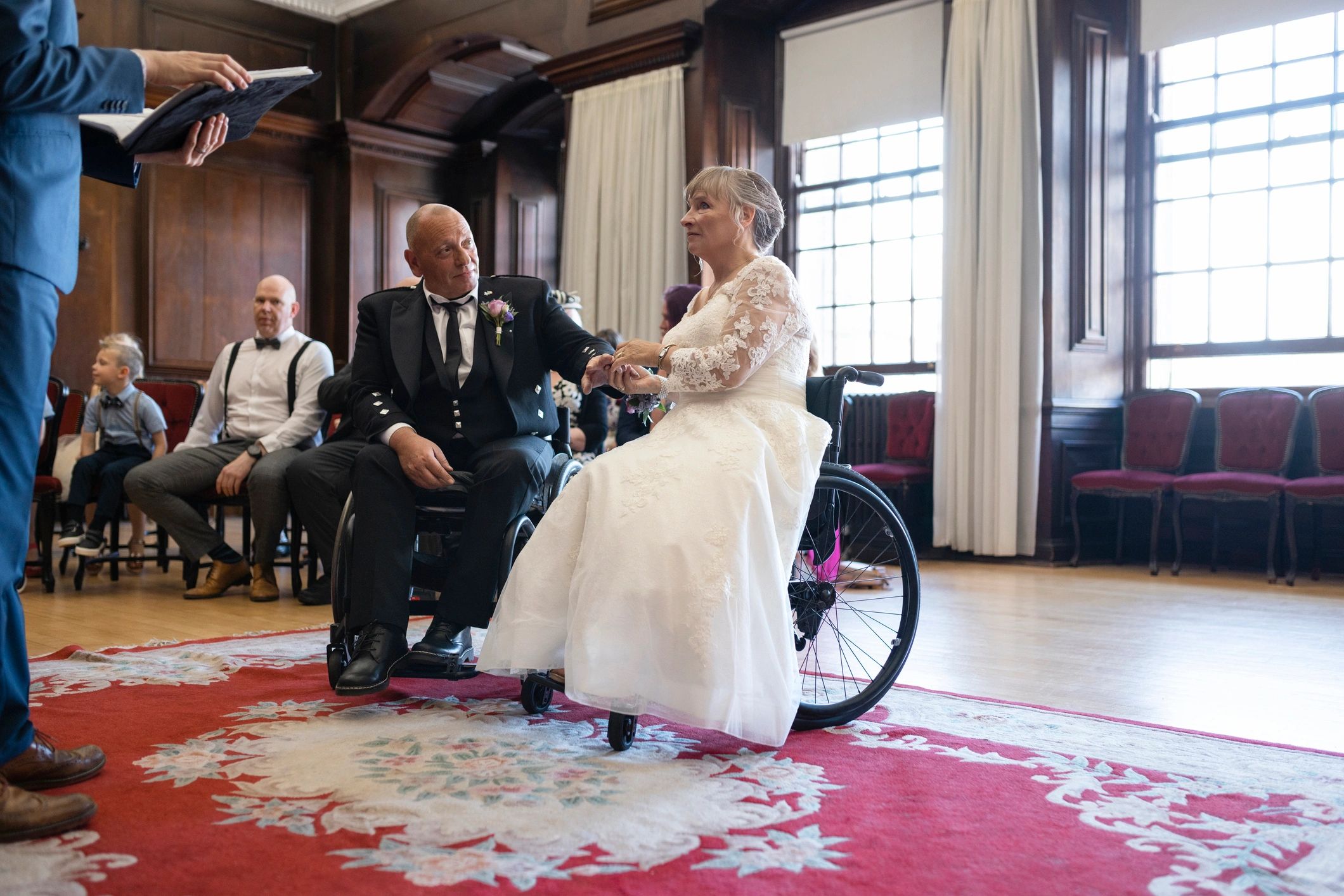 Couple exchanging vows and rings during a ceremony